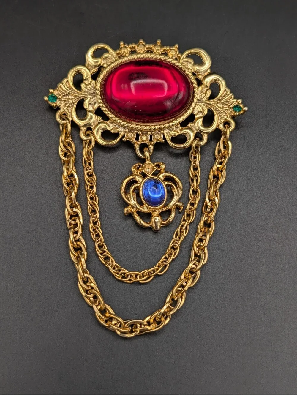 Vintage 1980s Regal Brooch Ruby Red Blue Glass Cabochon Draped Chain Pin